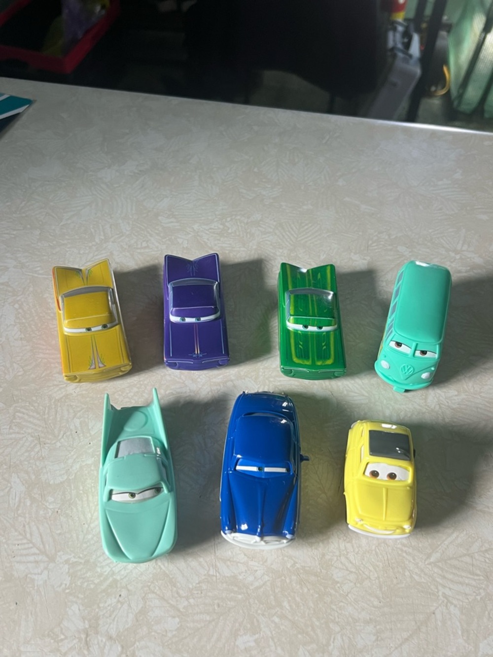 Disney Die-Cast Car Lot in Yellow, Purple, Green, Teal, Blue